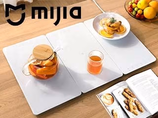 Vă va uimi pe bune! Xiaomi a lansat un încălzitor pliabil pentru alimente