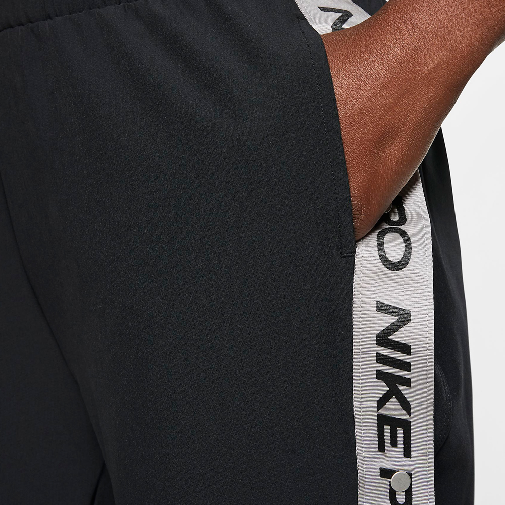 Pantaloni Nike W NP CLN TEAR AWAY PANT / Femei / M / Negru photo 3