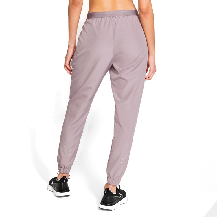 Брюки Nike W NK SWOOSH RUN TRK PANT / Женский / XL / Сиреневый photo 3