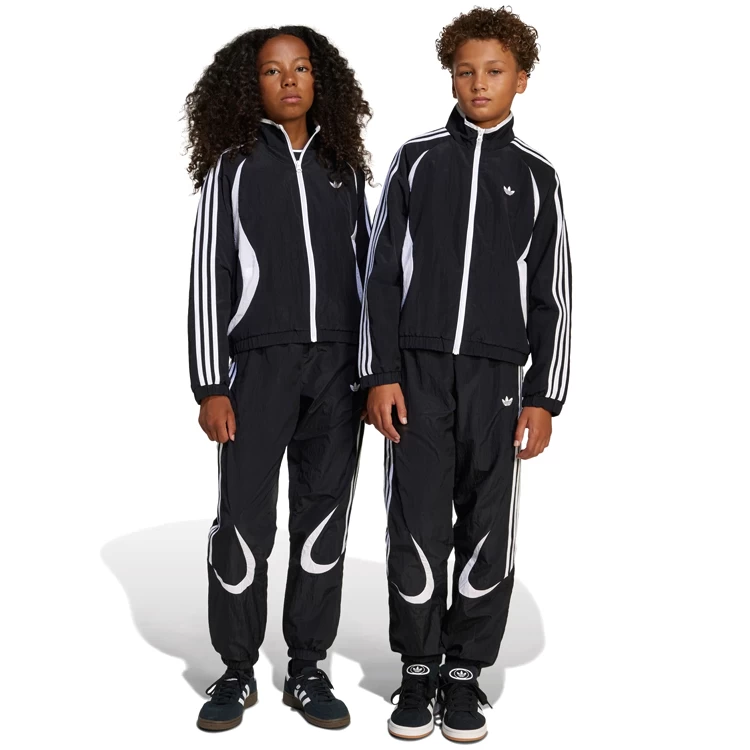 Брюки Adidas WOVEN TRACKPANT photo 1 Брюки Adidas WOVEN TRACKPANT photo 1
